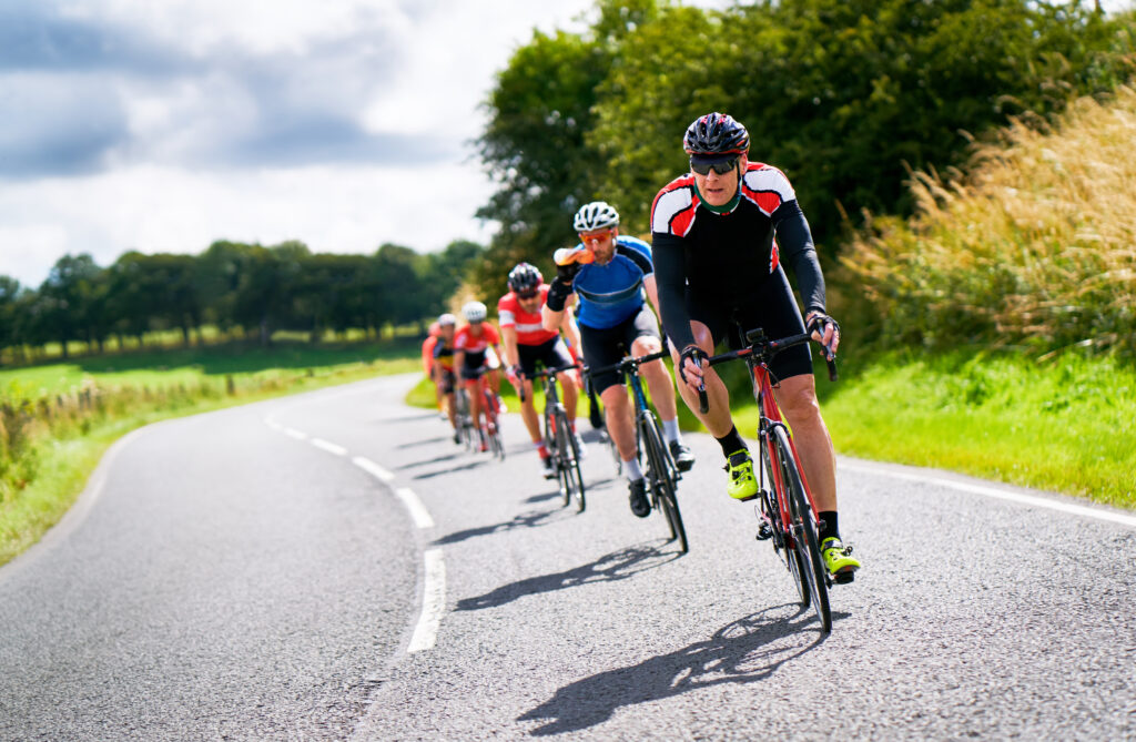Cyclists racing on country roads