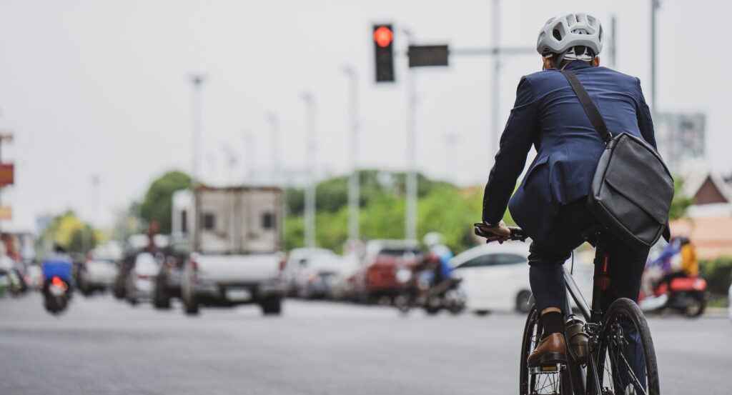 cyclist riding on a road