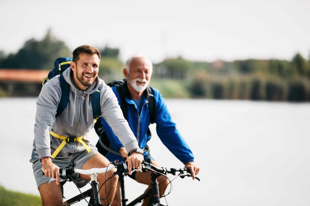 two men on a bike ride together 
